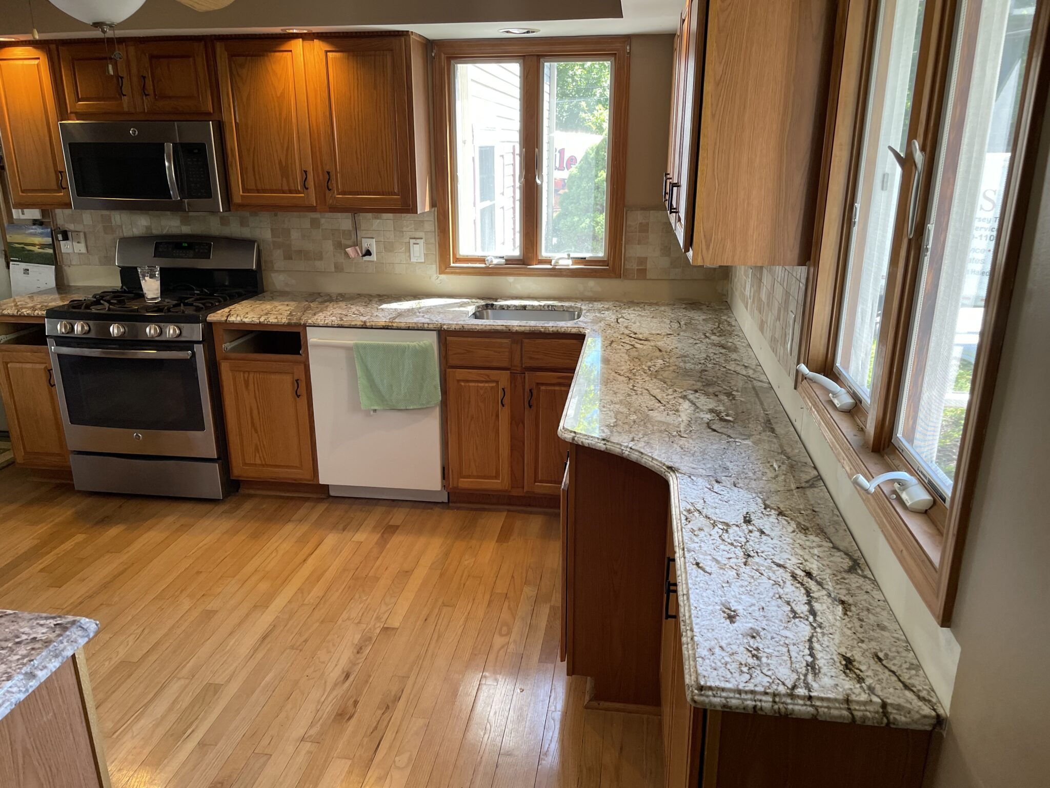 White and brown granite kitchen countertop.