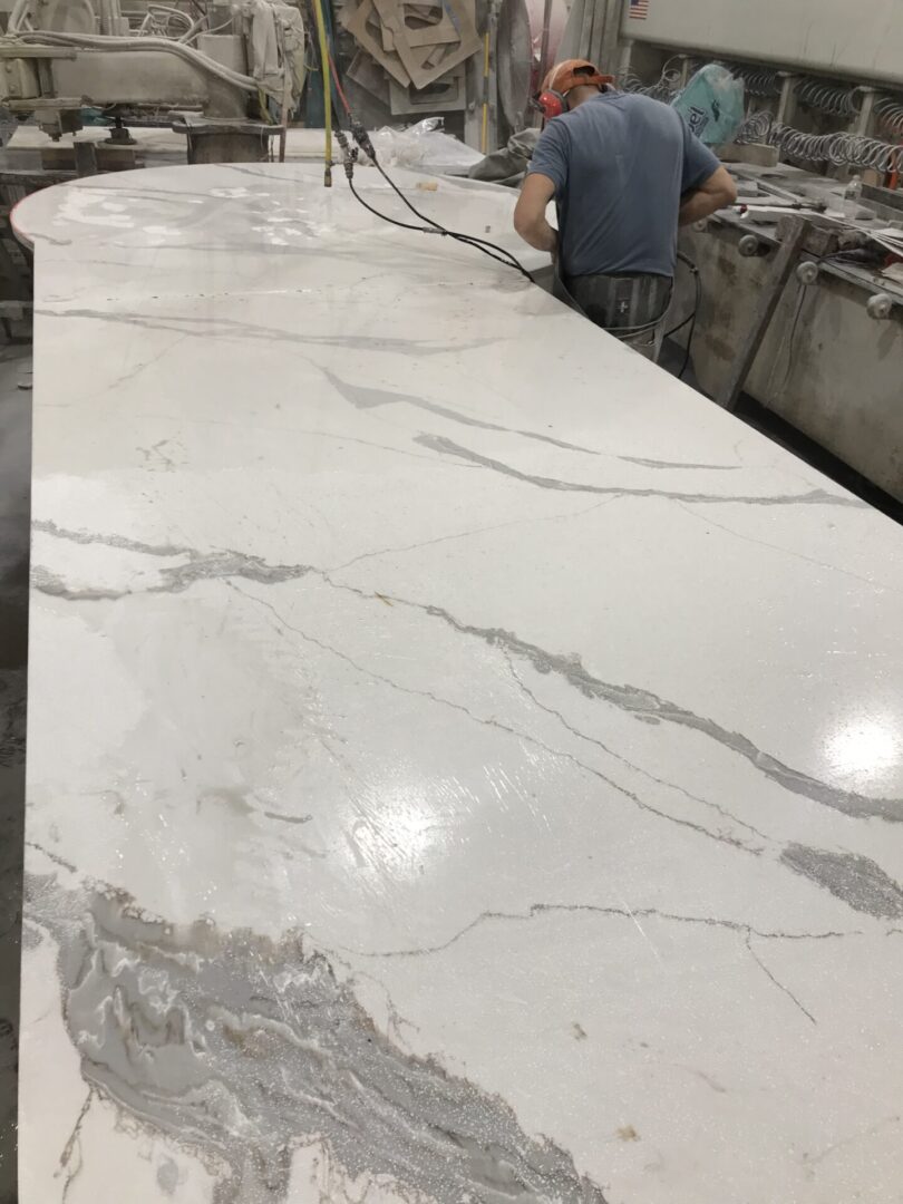 White marble countertop with gray veining.