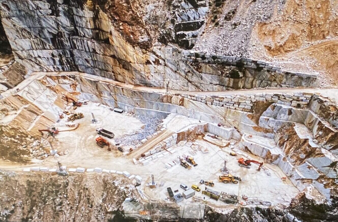 Aerial view of marble quarry with machinery.