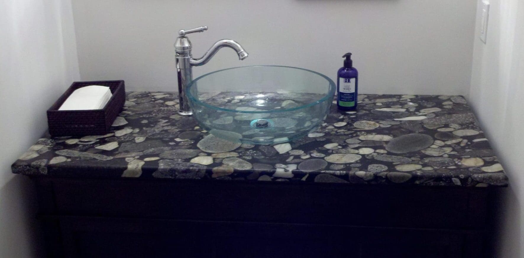 A glass bowl sitting on top of a counter.