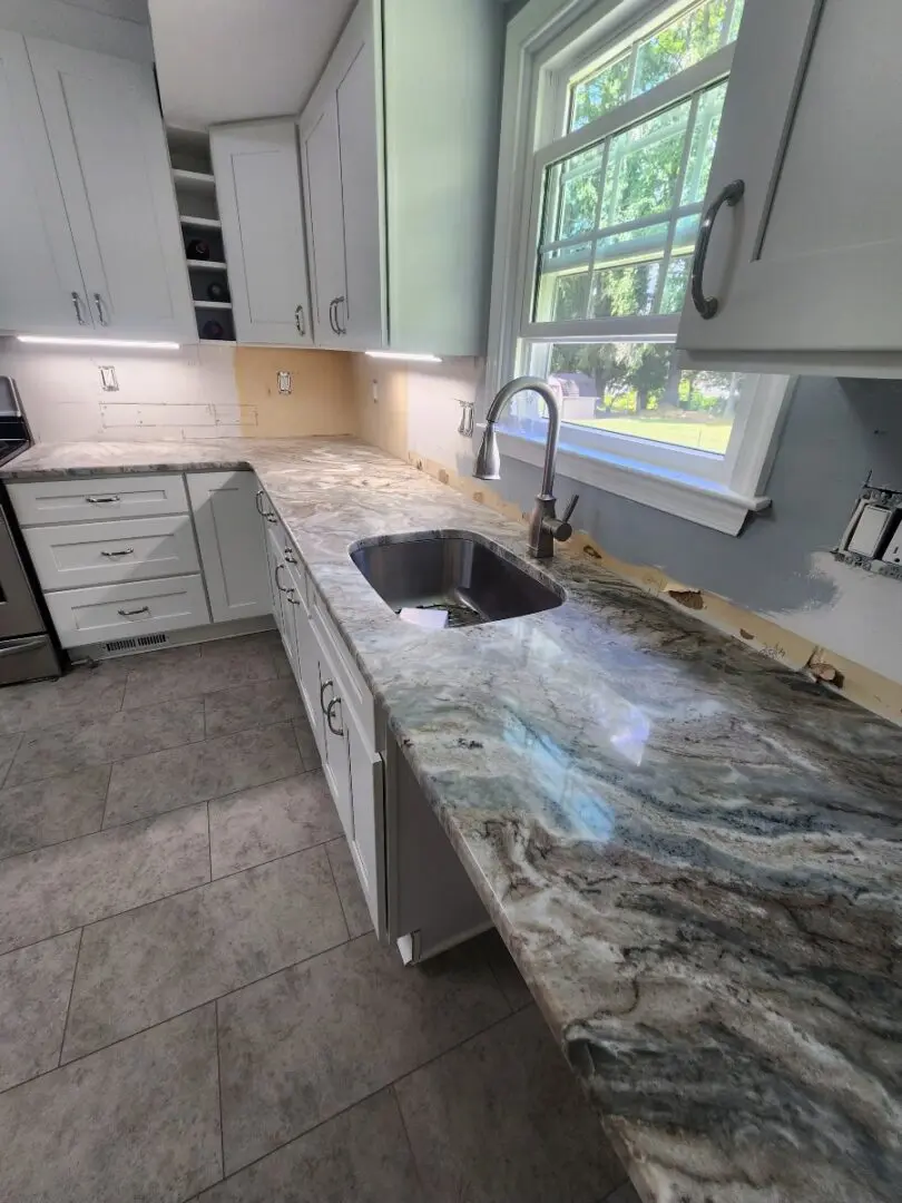 Kitchen countertop with brown and blue granite.