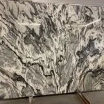 Large slab of white and black marble.