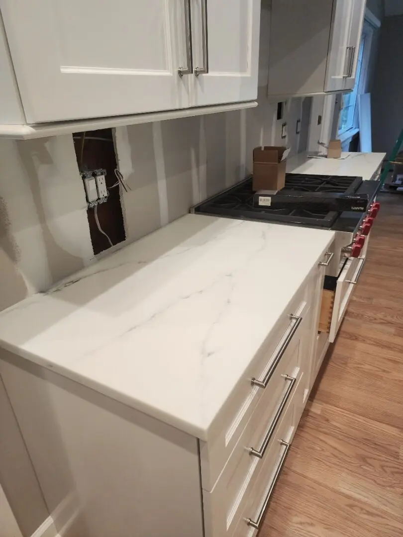 White marble countertop with drawers.