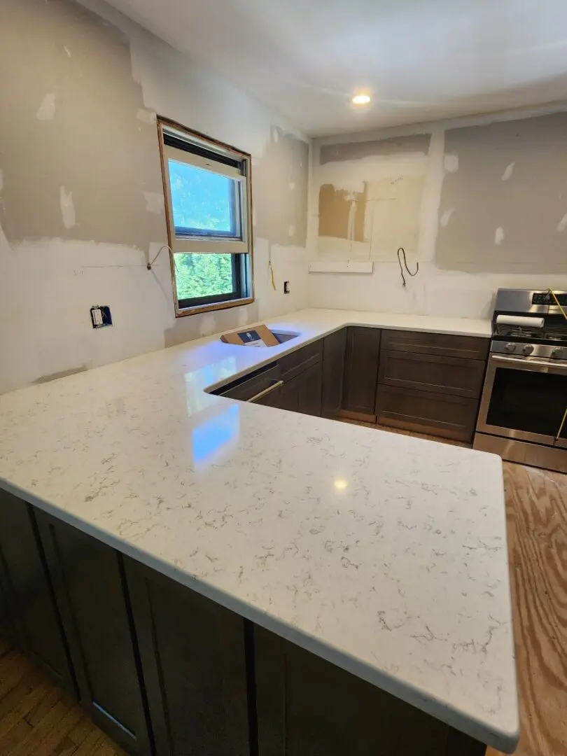 White countertop in a kitchen remodel.