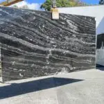 Black and white marble slab with veining.