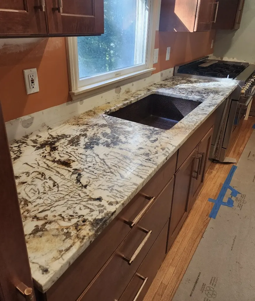 White and brown granite kitchen countertop.