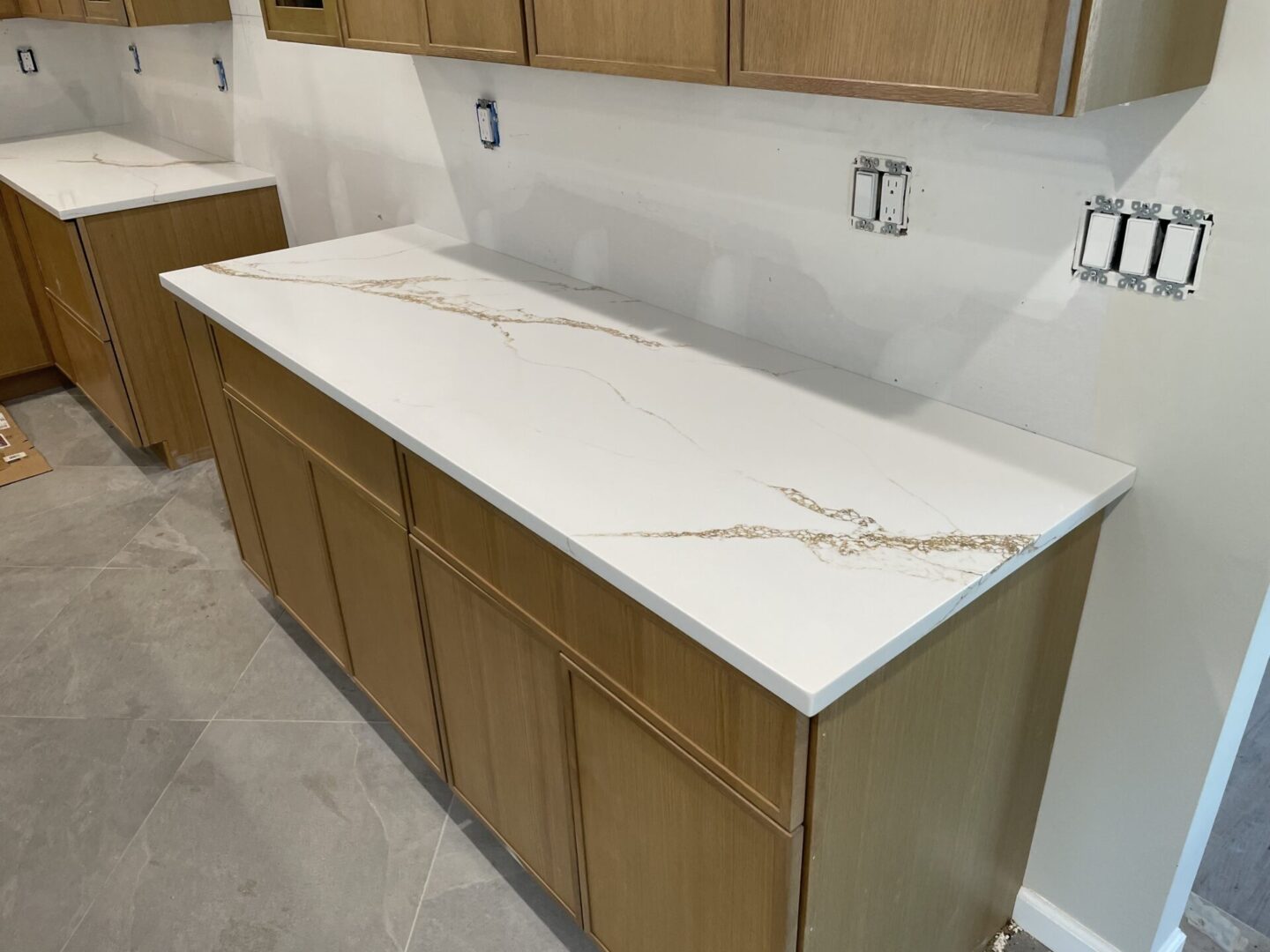 Quartz countertop installation in kitchen.